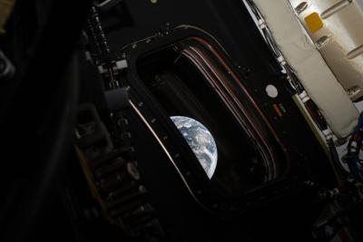inside the Artemis mission space capsul with a view of Earth through the window, image from NASA April 2, 2026