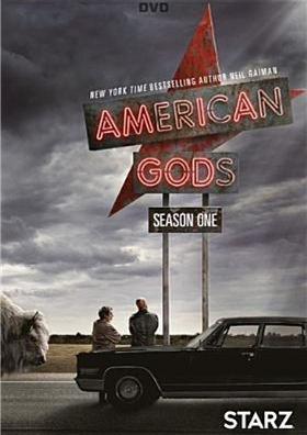 American Gods Season One DVD cover showing a two men leaning against a car underneath a road sign saying American Gods 