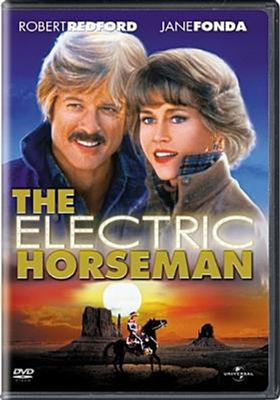 The Electric Horseman dvd cover; man and woman with a southwest landscape beneath them and a man in a lighted costume riding a horse