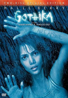 Gothika dvd cover; woman looking out a rain soaked window with hands placed against the glass; one arm say not alone