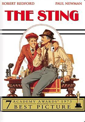 The Sting dvd cover; two men sitting on a desk with items like playing cards, liquor and an old phone