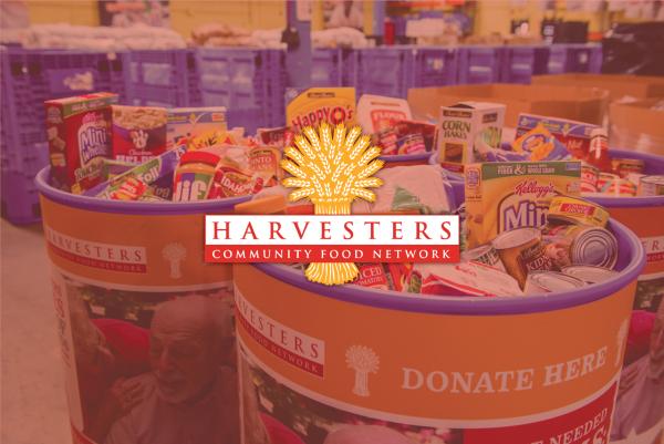 harvesters food network logo over image of food donation barrels
