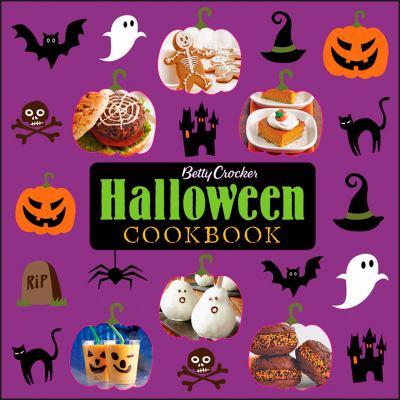 Cookbook cover of Betty Crocker Halloween Cookbook featuring a purple background with pictures of spooky-themes snacks and clipart images of black cats, jack-o-lanterns, spiders and other spooky silhouettes.