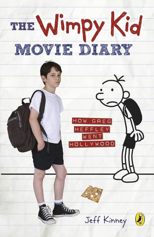 Diary of a Wimpy Kid movie poster with Greg Heffley's actor standing on the left and his drawn book character on the right.