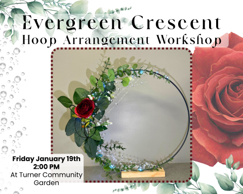 Picture of a hoop floral arrangement made with eucalyptus and a rose.