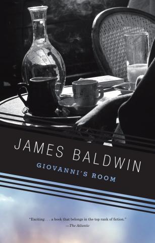 Cover for Giovanni's Room by James Baldwin. It depicts in black-and-white an outdoor dining area with a teacup, water pitcher, and glass of water, as well as the hand of the person sitting there.
