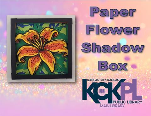 An orange and yellow lily image in a black shadow box on a pastel gradient background with the words "paper flower shadow box" and the library logo beside it