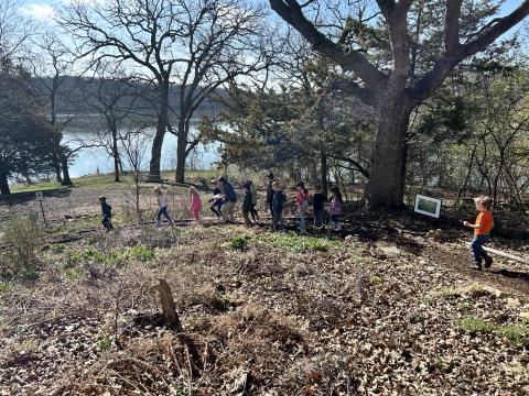 Children walking on our mini trail searching for things