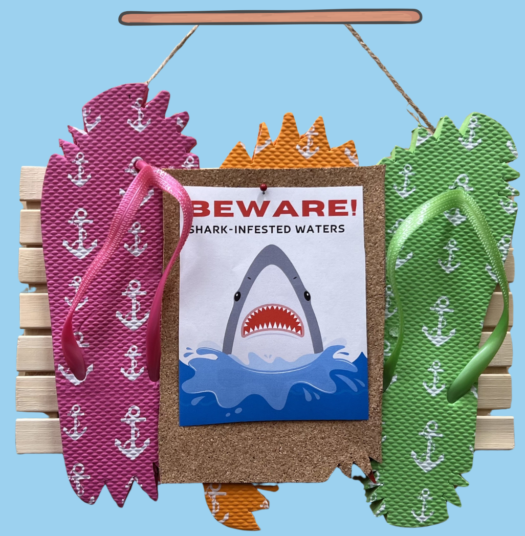 sign made with flip flops that look like sharks have taken bites
