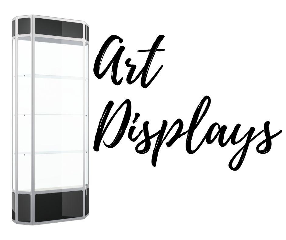 Art Displays words next to a tall glass display case