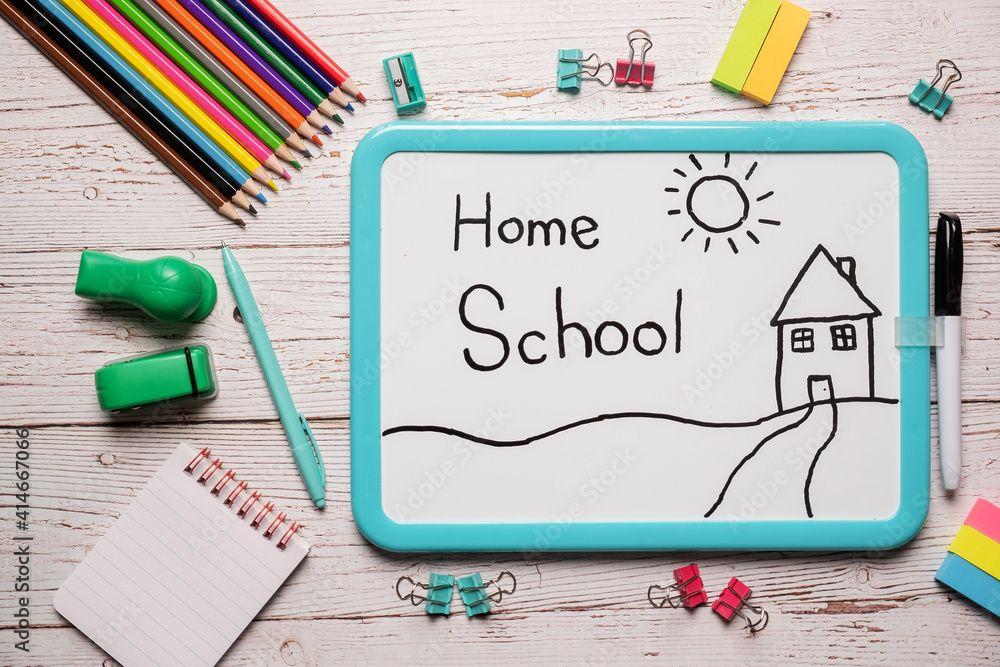 Dry Erase board with Home School written on it.