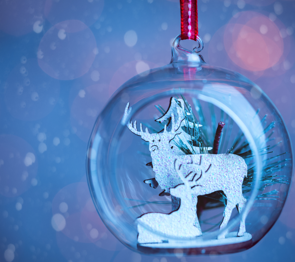 clear ornament with deer cut out inside