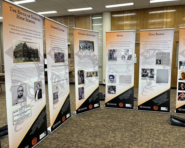 poster display stands with information about the history of Sumner High School